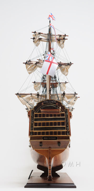 ALDO Hobbies & Creative Arts> Collectibles> Scale Model L: 40 W: 13.75 H: 69 Inches / Brown / Wood HMS Victory Admiral Nelson Flagship Tall Ship Large Sailboat Exclusive Edition Wood Model Assembled With Floor Display Case