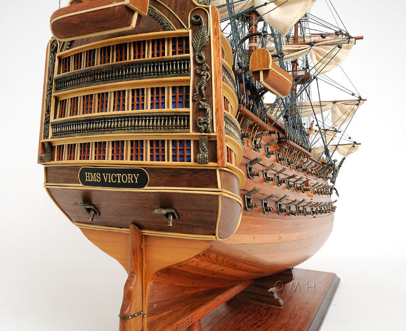 Aldo Hobbies & Creative Arts> Collectibles> Scale Model new / Wood / L: 35.4 W: 13.5 H: 29.5 Inches HMS Victory Midsize EE Tall Ship Wood Model Sailboat Assembled  With Display Case Front Open and Glass